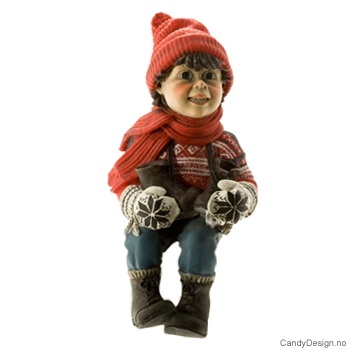 Kantsittende Julebarn - Gutt med skøyter