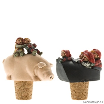 Nisser i seng med mer på korker