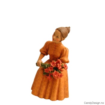 Sittende blomsterdame i gul kjole