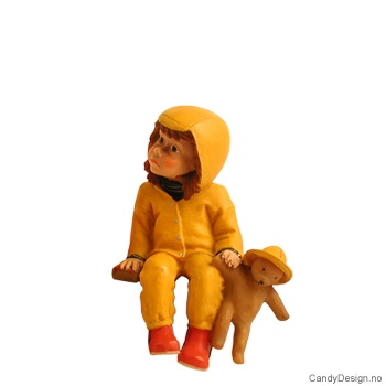 Barnehagebarn sittende på kant