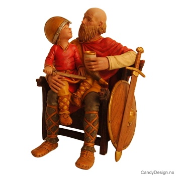 Viking far sittende på trone med gutt med vikinghjelm på fanget i farger